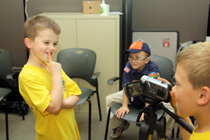 Boy Scouts learning how to video tape at the ADMC
